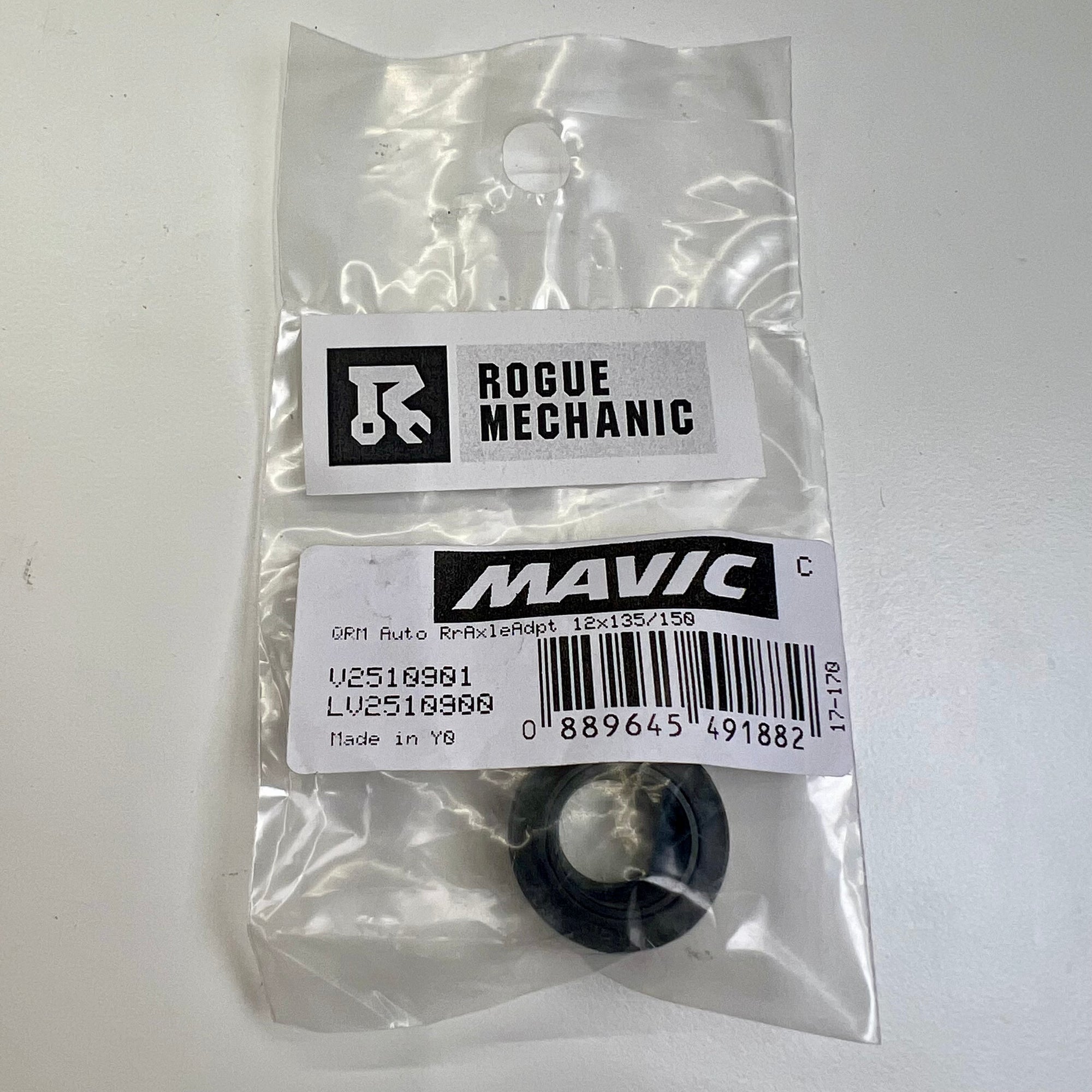 Mavic rear QRM auto axle adapter packaged in a clear plastic bag with a label that includes the Mavic and Rogue Mechanic brand logos, as well as product information. Mavic Rear QRM Auto 12x135mm Axle Adapter V2510901